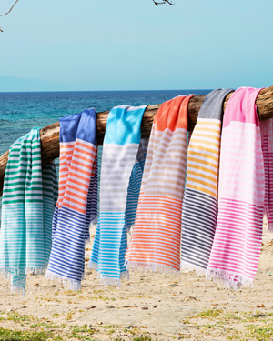 Towel to Go Bali quick-dry beach towels in a lifestyle setting.