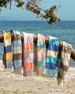 Towel to Go Palermo quick-dry beach towels in a lifestyle setting.