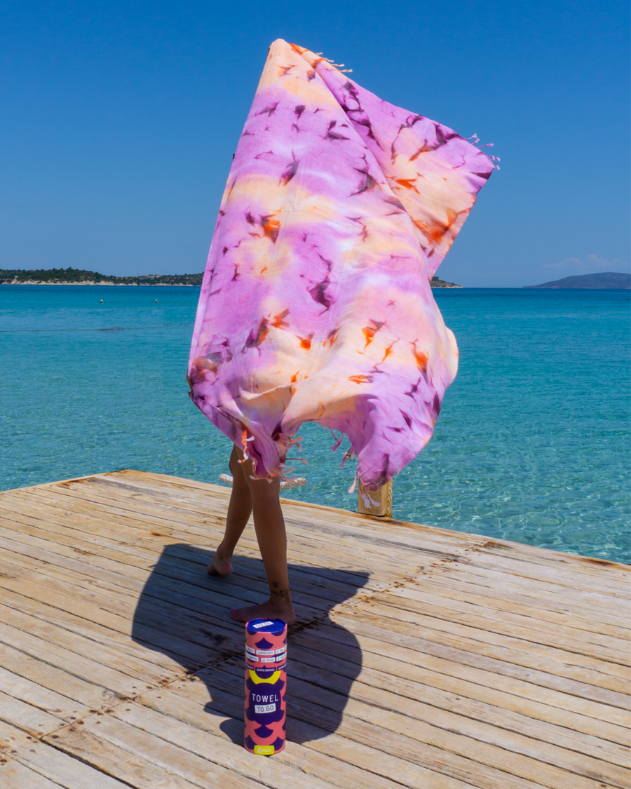 Towel to Go Tie Dye in Purple and Orange quick-dry beach towel.