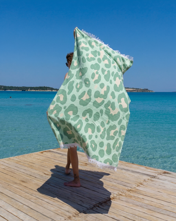 Jacquard hammam towel with Neon Safari leopard print in Sage Green and Blush Pink – Towel To Go.
