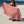 Woman using a Towel to Go Quick Dry Cotton Towel in Camel and Rose from the Neon Safari on the beach.