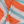 Close-up of the cotton weave and fringes of the Towel to Go Quick Dry Cotton Towel Orange and Mint from the Coral Coast collection.