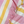 Close-up of the cotton weave and fringes of the Towel to Go Quick Dry Cotton Towel Rose and Sunset from the Coral Coast collection.