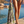 Woman using a Towel to Go Quick Dry Cotton Towel in Grey and Lime from the Neon Safari on the beach 3.